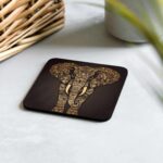 Handcrafted elephant coaster featuring intricate mandala pattern and cork backing