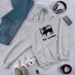 Lifestyle photo showing the versatility of the Flag Lion Hoodie