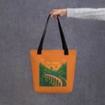 Model showing the scale of the 39cm x 39cm Nine Arches Whistle Tote Bag.