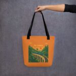 The Nine Arches Whistle Tote Bag used as a stylish shopping bag, part of our Sri Lankan Merch line.